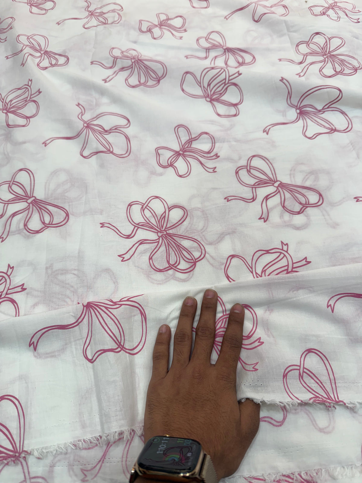 Buy Premium Cotton Cambric White Base Pink Bow Printed Fabric