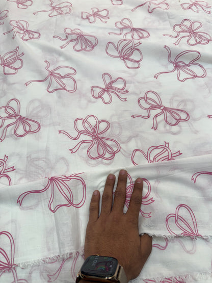 Buy Premium Cotton Cambric White Base Pink Bow Printed Fabric