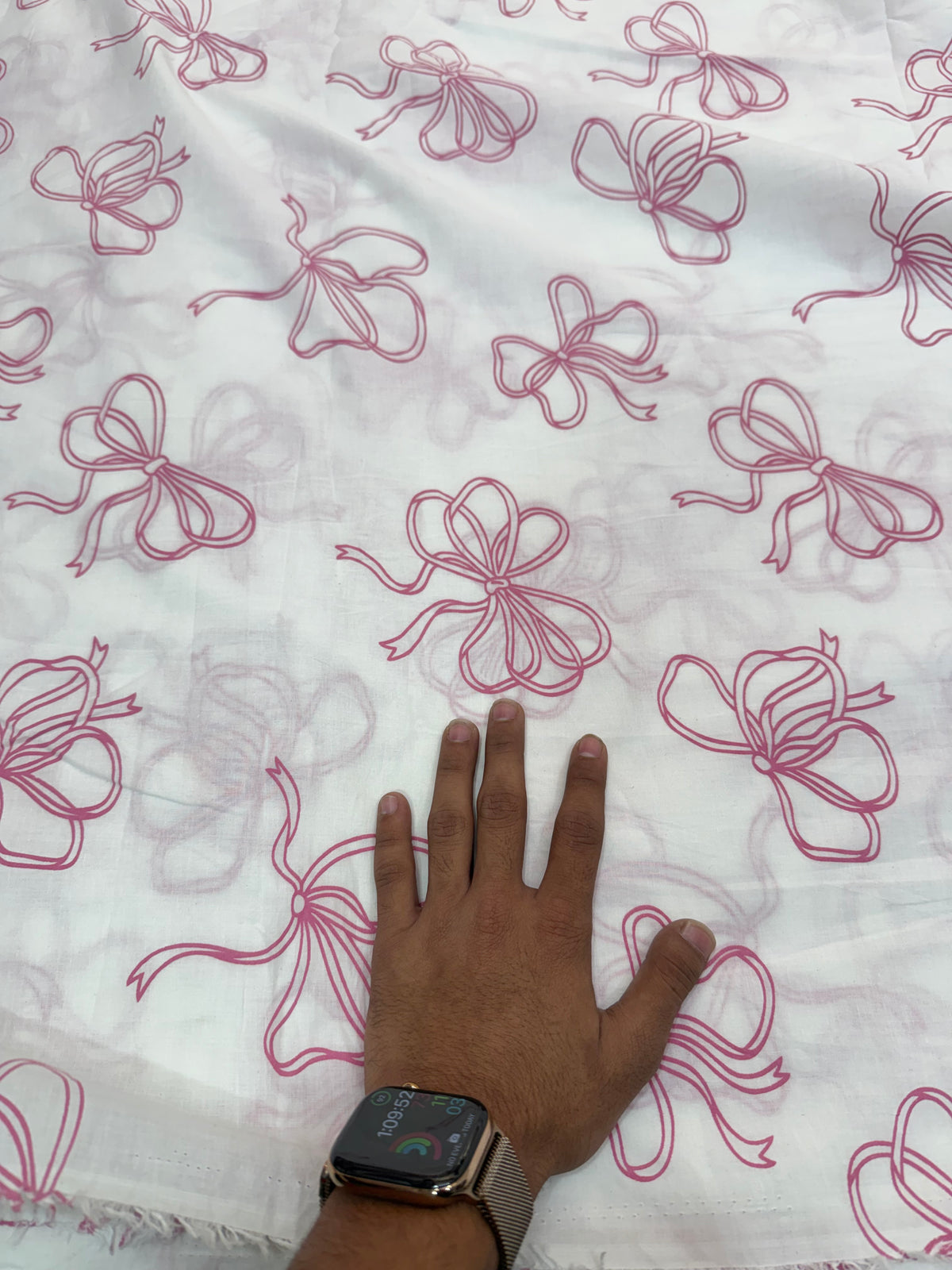 Buy Premium Cotton Cambric White Base Pink Bow Printed Fabric