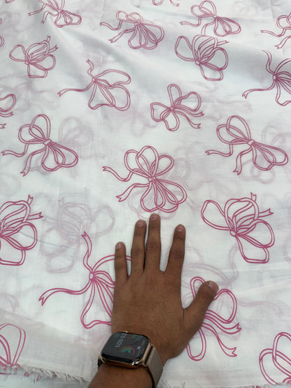 Buy Premium Cotton Cambric White Base Pink Bow Printed Fabric