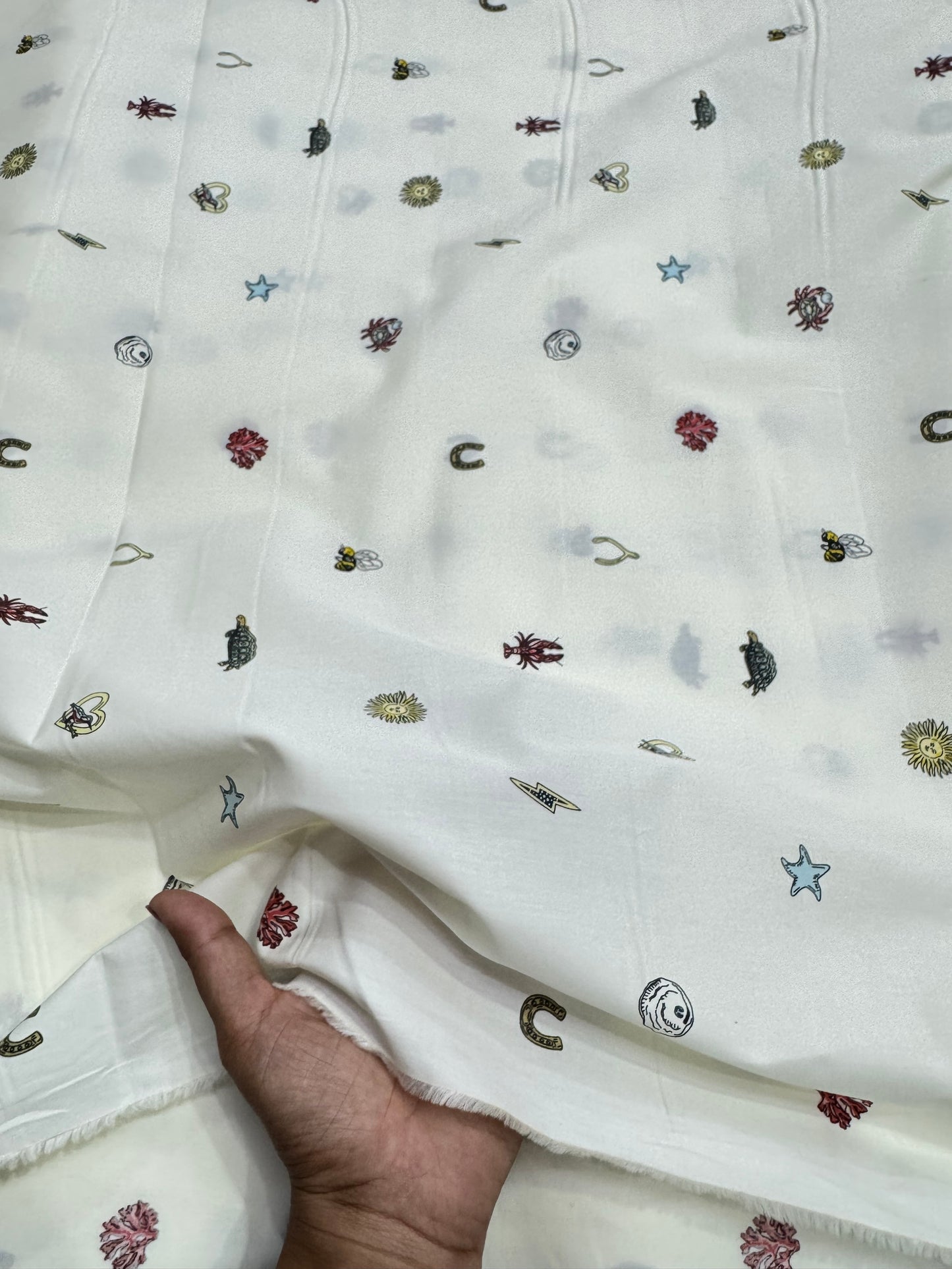 Buy Mul Cotton Ivory Base Cute Printed Fabric