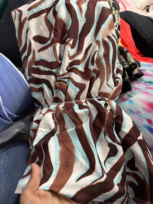 Buy Viscose Crepe Vibrant Animal Blue Brown Printed Fabric