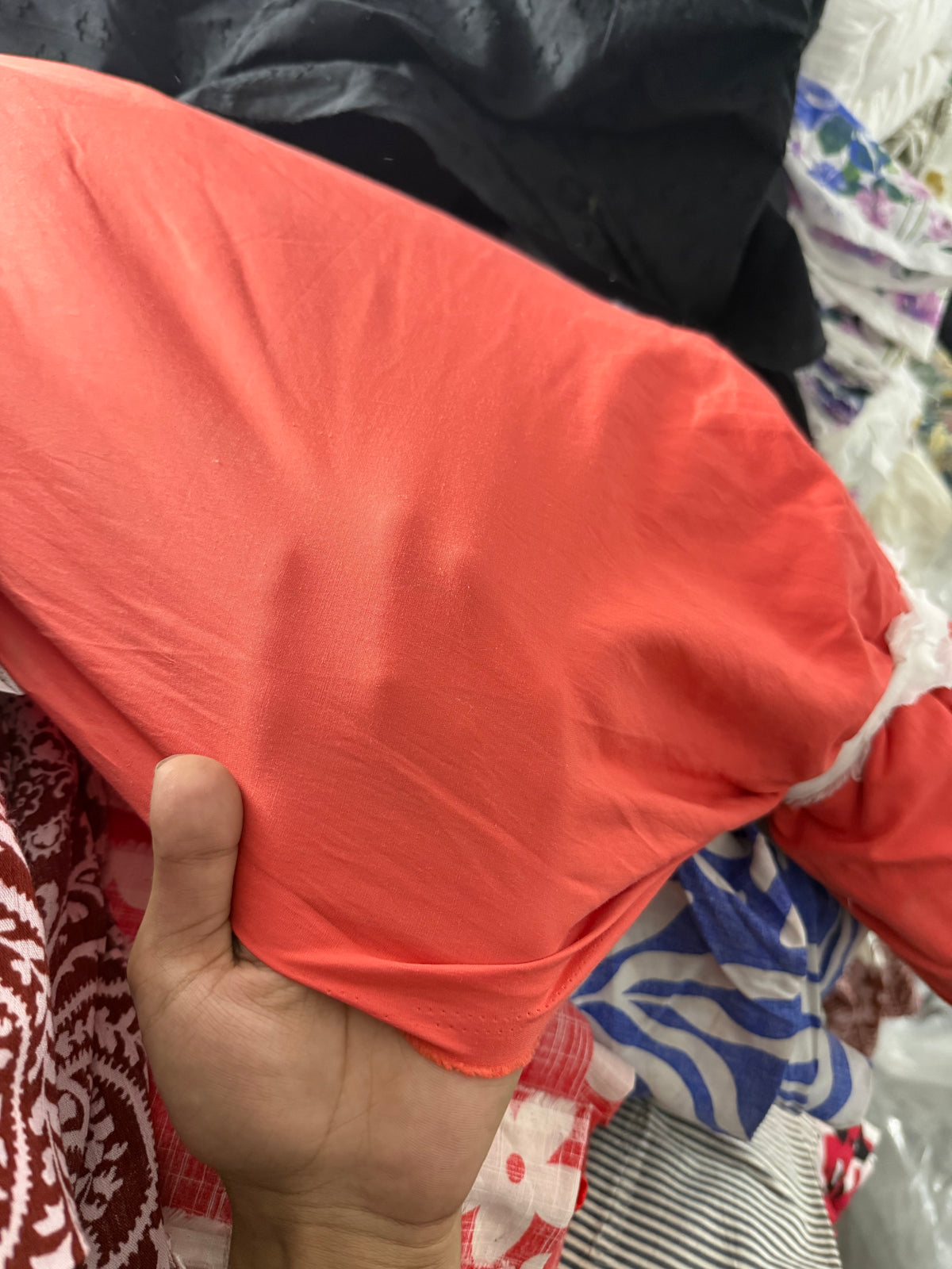Buy Cambric Solid Coral Orange Fabric
