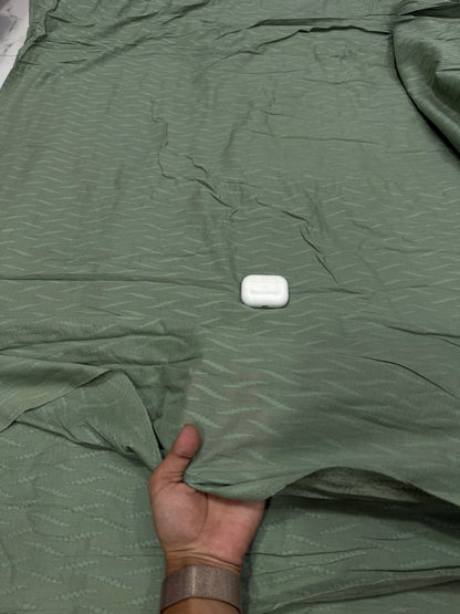 Buy Cambric Olive Green Self Tonal Wave Dobby Fabric