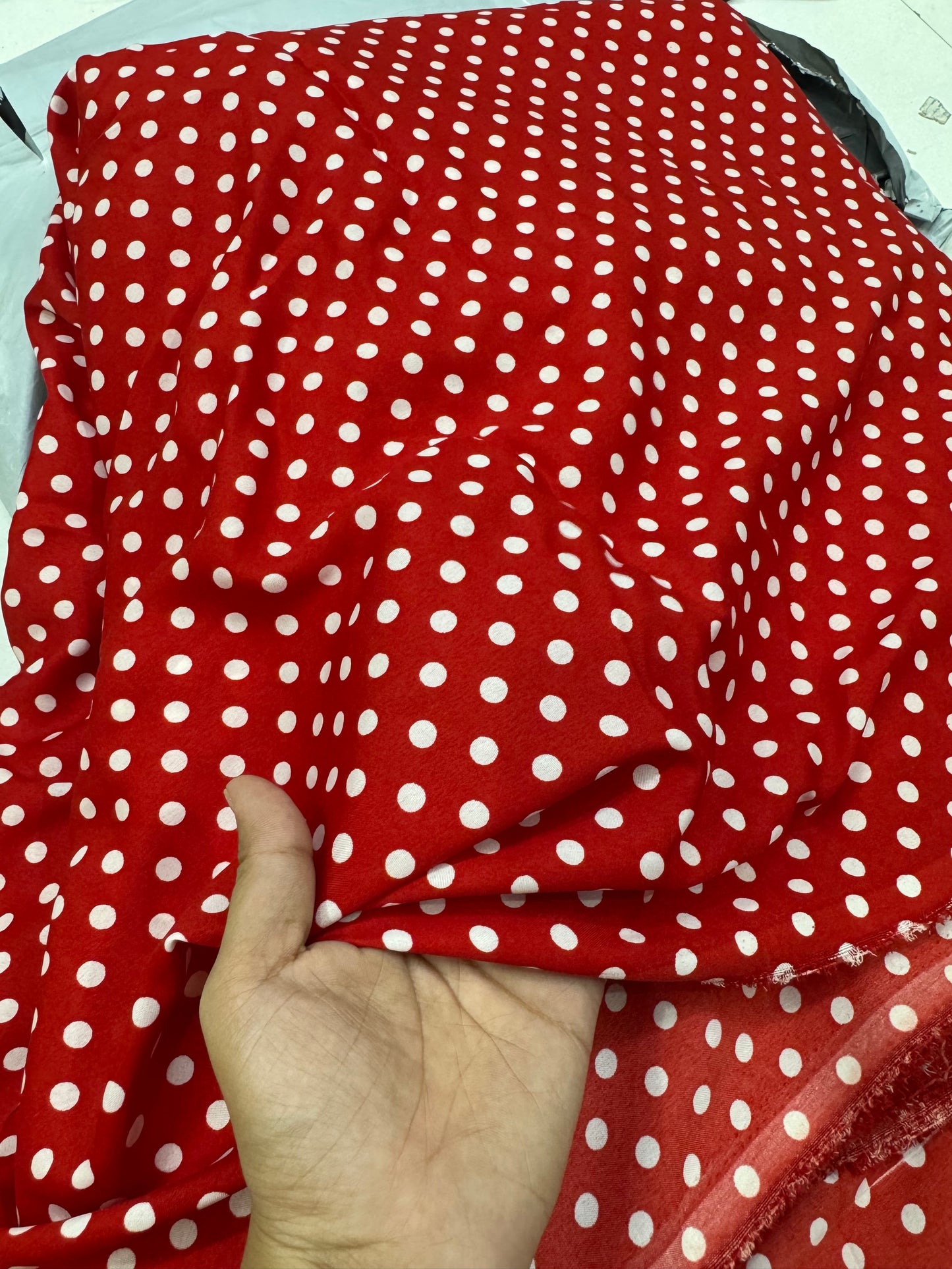 Buy Banana Crepe Red Base Polka Dot Printed Fabric