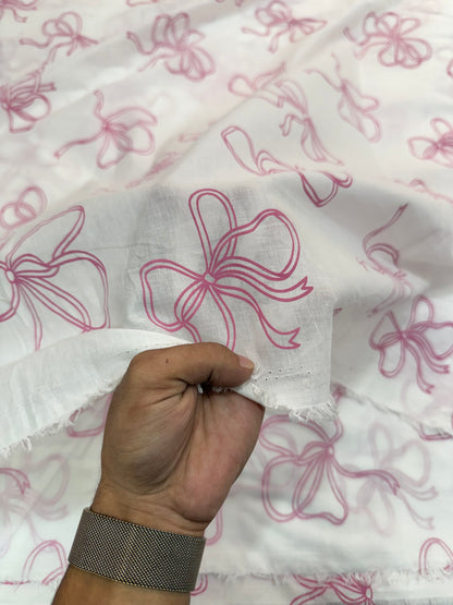 Buy Premium Cotton Cambric White Base Pink Bow Printed Fabric