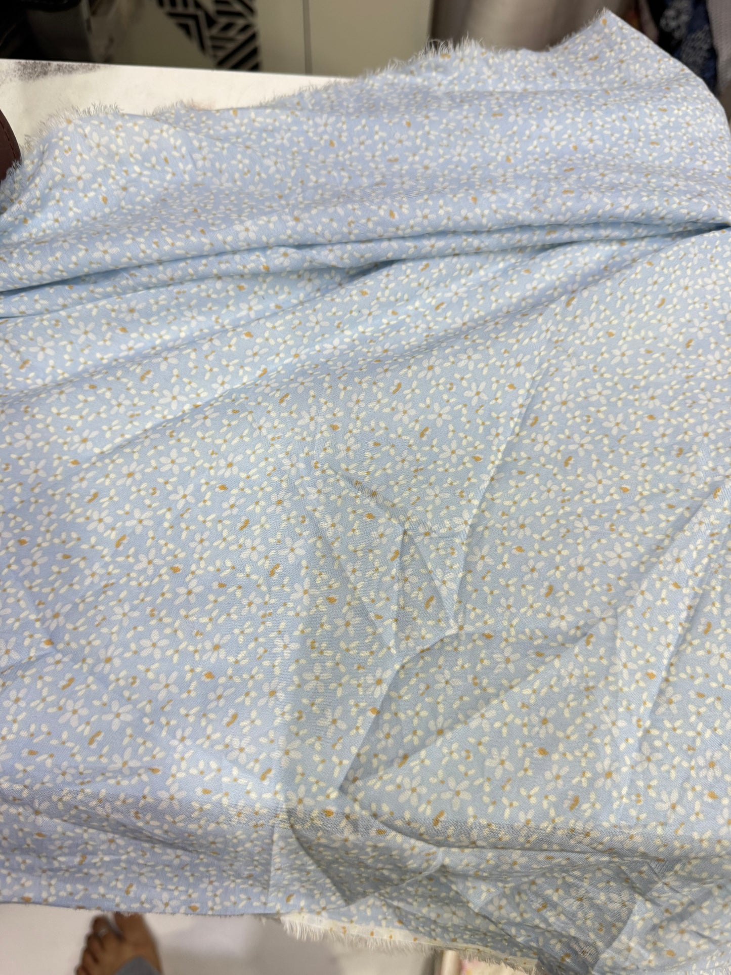Buy Mul Cotton Baby Blue Base Tiny Floral Fabric