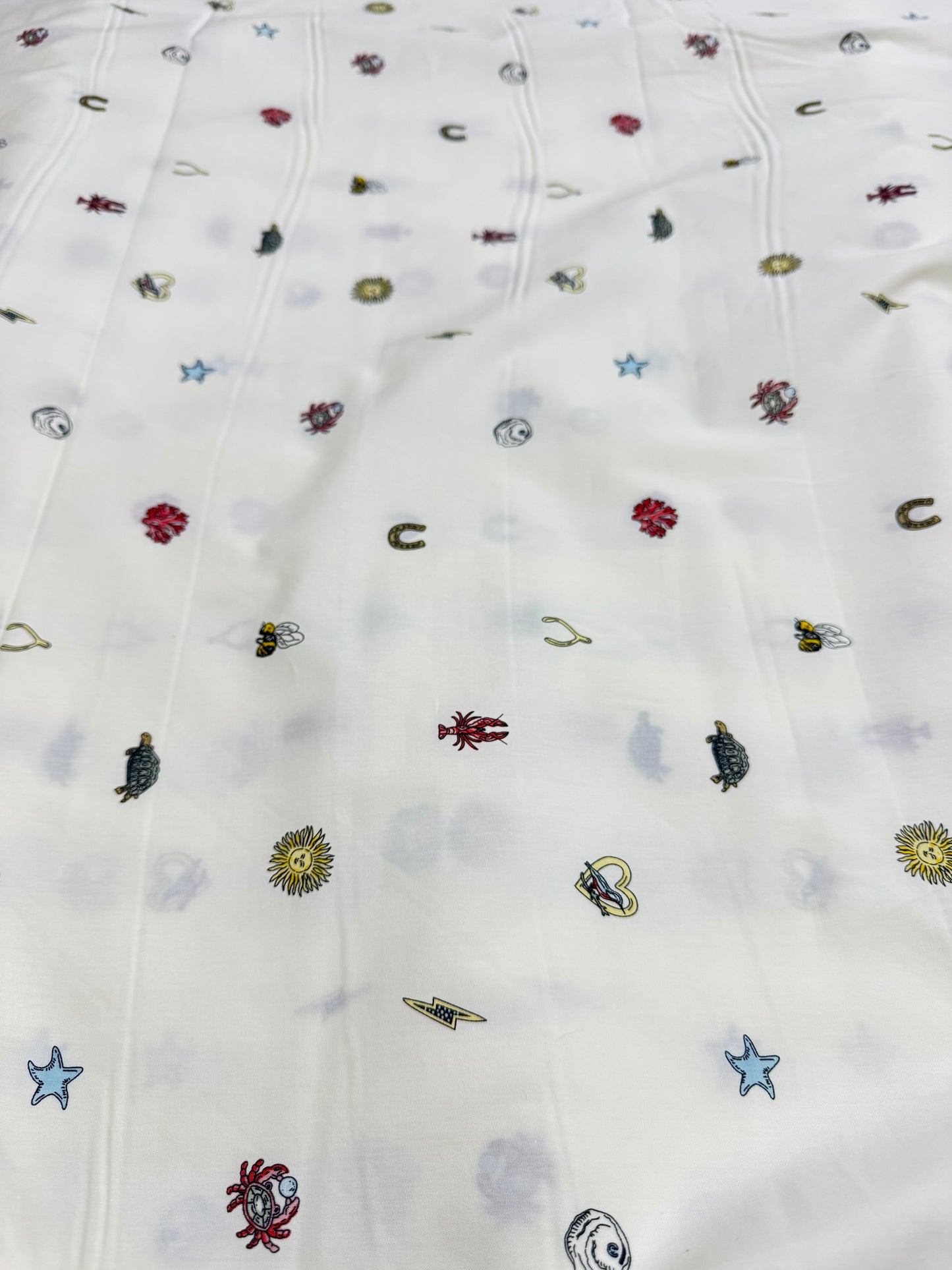 Buy Mul Cotton Ivory Base Cute Printed Fabric