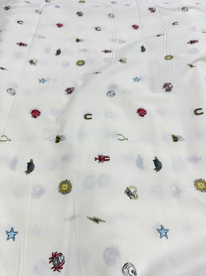Buy Mul Cotton Ivory Base Cute Printed Fabric