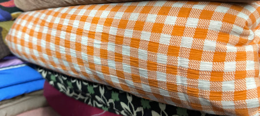 Buy Cotton Crinkled Crepe Orange White Check Printed Fabric