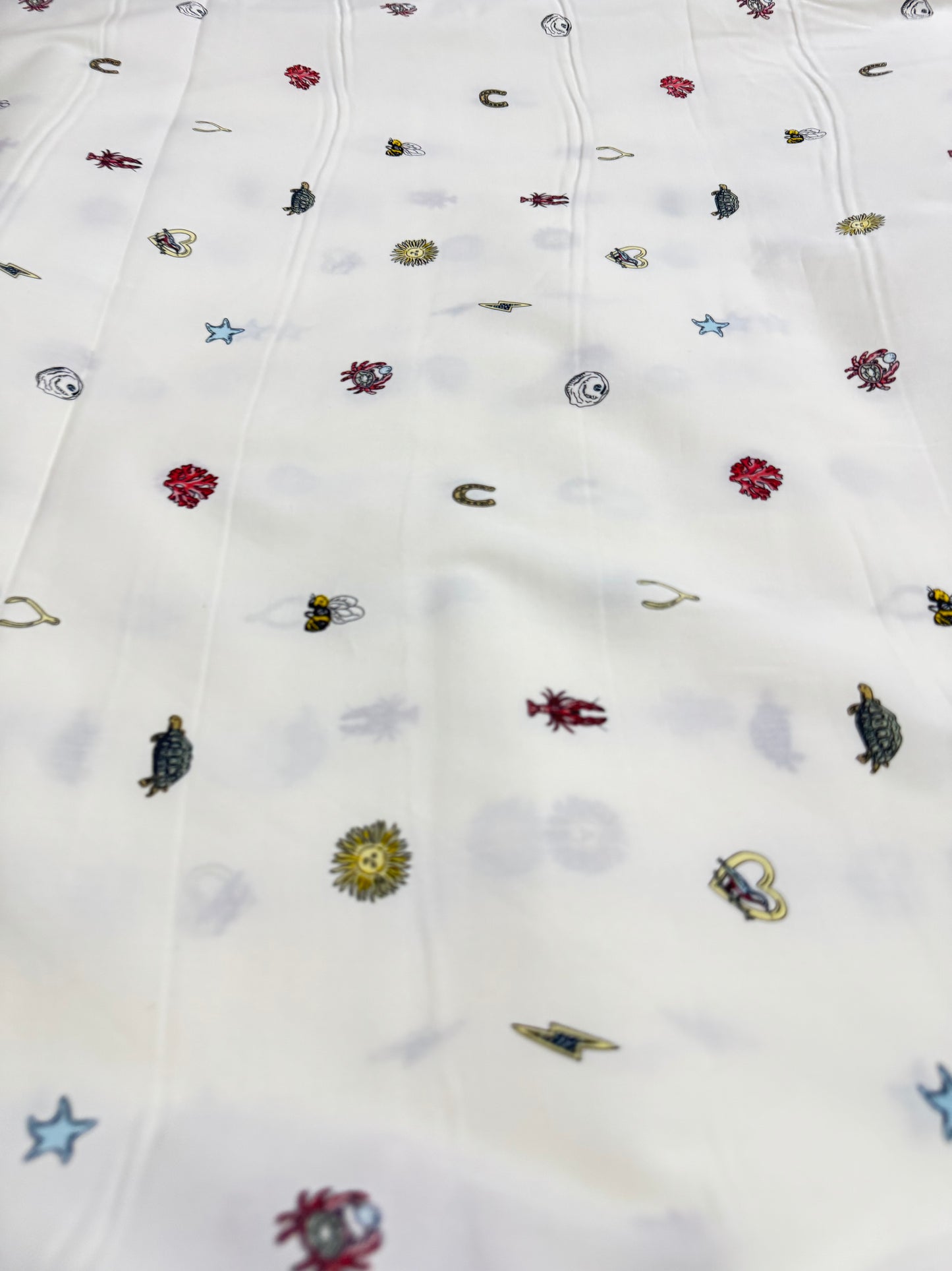 Buy Mul Cotton Ivory Base Cute Printed Fabric